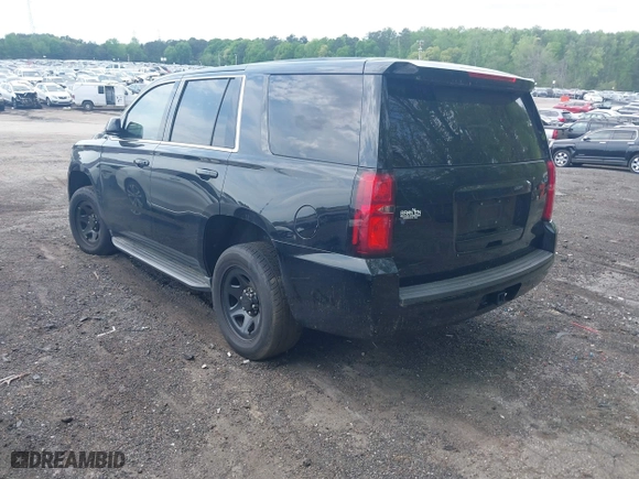 2019 Chevrolet Tahoe Commercial with VIN 1GNLCDECXKR208052, listed as a IAAI auction lot 42014348 with 96,455 mi miles. Bid and sale history available at carsss.com. Image 3.
