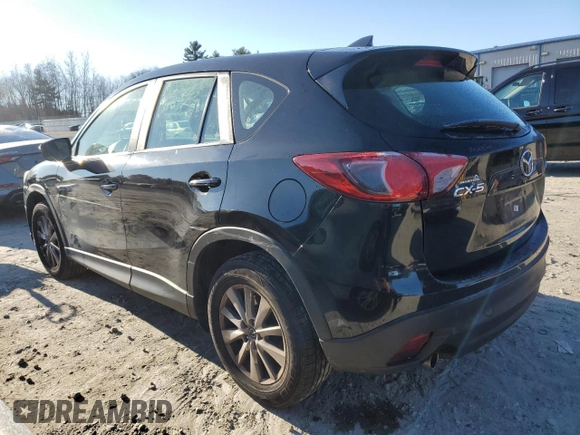 2016 Mazda CX-5 Sport with VIN JM3KE2BE1G0629430, listed as a Copart auction lot 82442654 with 130,289 mi miles and Salvage Title. Bid and sale history available at DreamBid. Image 2.
