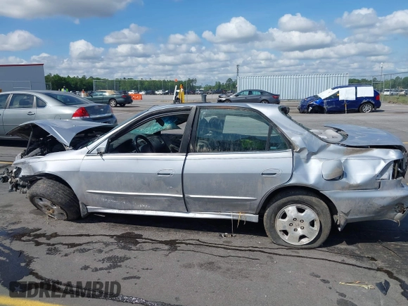 2001 Honda Accord EX z VIN 1HGCG16561A021742, wystawiony jako IAAI lot #42138513 z przebiegiem 217 113 mil mil oraz . Historia ofert i sprzedaży dostępna na DreamBid. Obrazek 15.
