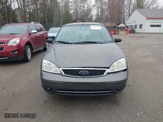 2006 Ford Focus S with VIN 1FAFP37N26W180795, listed as a IAAI auction lot 42100395 with 125,002 mi miles. Bid and sale history available at carsss.com. Image 13.