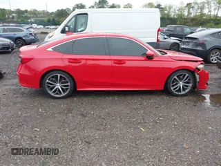 2022 Honda Civic Touring z VIN 2HGFE1F99NH316766, wystawiony jako IAAI lot #42198474 z przebiegiem 49 368 mil mil oraz . Historia ofert i sprzedaży dostępna na DreamBid. Obrazek 13.