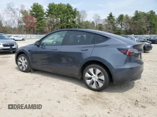 2023 Tesla Model Y Long Range with VIN 7SAYGDEE7PA031199, listed as a Copart auction lot 53876105 with 10,835 mi miles and Salvage Title. Bid and sale history available at DreamBid. Image 2.