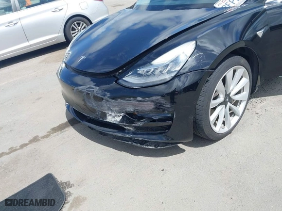 2018 Tesla Model 3 Long Range Battery with VIN 5YJ3E1EA3JF060296, listed as a IAAI auction lot 41901636 with 110,847 mi miles. Bid and sale history available at carsss.com. Image 6.