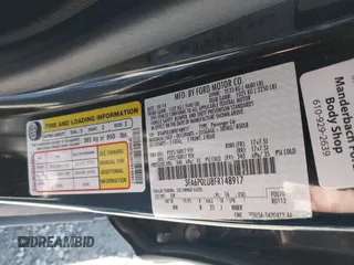 2015 Ford Fusion SE Hybrid with VIN 3FA6P0LU8FR148917, listed as a IAAI auction lot 41876627 with 253,952 mi miles. Bid and sale history available at carsss.com. Image 9.