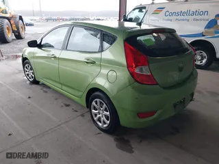 2014 Hyundai Accent GS with VIN KMHCT5AE6EU168619, listed as a IAAI auction lot 41856429 with 227,552 mi miles. Bid and sale history available at carsss.com. Image 3.
