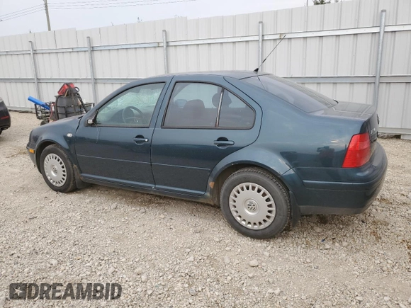 2002 Volkswagen Jetta с VIN 3VWSB29M42M068867, выставлен на аукционе Copart как лот 67406454 с пробегом 214 613 миль миль и Списание • Salvage title. История ставок и продаж доступна на DreamBid. Изображение 2.
