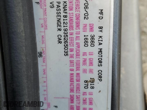 2003 Kia Spectra with VIN KNAFB121935265035, listed as a Copart auction lot 86407934 with 201,586 mi miles and Salvage Title. Bid and sale history available at DreamBid. Image 14.