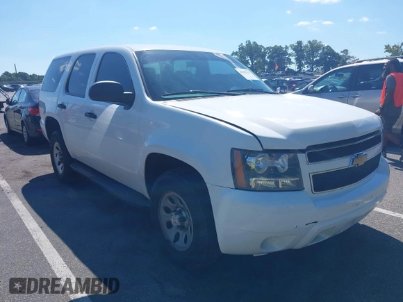 2013 Chevrolet Tahoe Commercial z VIN 1GNSK2E01DR268491, wystawiony jako IAAI lot #40302113 z przebiegiem 183 889 mil mil oraz . Historia ofert i sprzedaży dostępna na DreamBid. Obrazek 1.