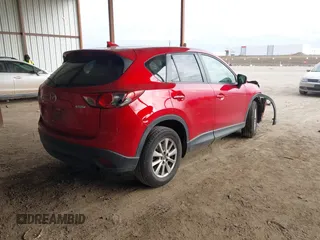 2016 Mazda CX-5 Touring with VIN JM3KE2CY0G0691927, listed as a IAAI auction lot 41611743 with 160,246 mi miles. Bid and sale history available at carsss.com. Image 4.