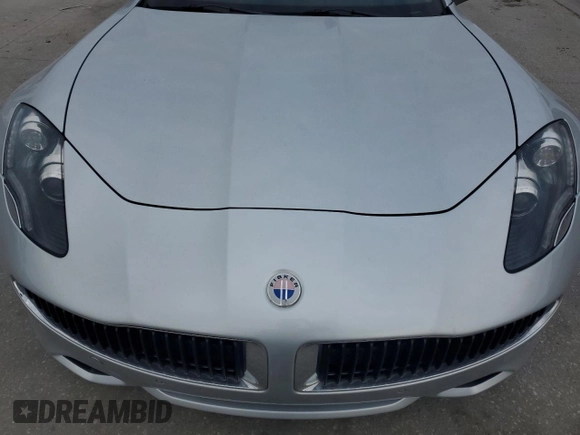 2012 Fisker Karma EcoSport с VIN YH4K14AA0CA001402, выставлен на аукционе Copart как лот 82791574 с пробегом Не указан миль и Списание • Salvage title. История ставок и продаж доступна на DreamBid. Изображение 11.