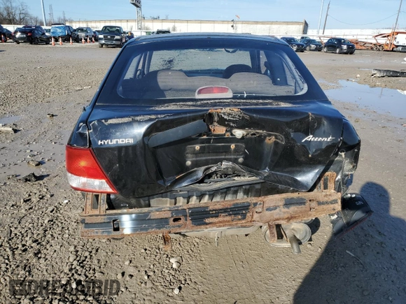 2002 Hyundai Accent z VIN KMHCF35G22U174792, wystawiony jako Copart lot #47281545 z przebiegiem 273 228 mil mil oraz Szkoda całkowita • Salvage title. Historia ofert i sprzedaży dostępna na DreamBid. Obrazek 6.