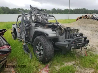 2021 Jeep Wrangler Unlimited Rubicon with VIN 1C4JJXFM3MW607999, listed as a Copart auction lot 49765454 with 0 mi miles and Salvage Title. Bid and sale history available at carsss.com. Image 4.
