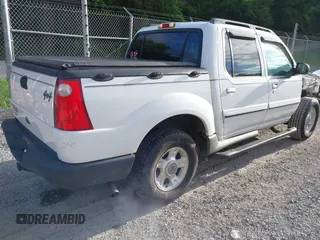 2003 Ford Explorer Sport Trac XLS z VIN 1FMZU77E33UA26042, wystawiony jako IAAI lot #42524905 z przebiegiem 124 878 mil mil oraz . Historia ofert i sprzedaży dostępna na DreamBid. Obrazek 4.