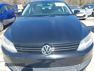 2014 Volkswagen Jetta Sedan SE w/Connectivity with VIN 3VWD07AJ5EM382352, listed as a IAAI auction lot 41722041 with 222,806 mi miles. Bid and sale history available at carsss.com. Image 6.