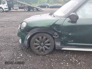 2019 MINI Countryman Cooper S z VIN WMZYT5C5XK3G94330, wystawiony jako IAAI lot #42310854 z przebiegiem 64 396 mil mil oraz . Historia ofert i sprzedaży dostępna na DreamBid. Obrazek 6.