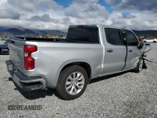 2022 Chevrolet Silverado 1500 Custom with VIN 3GCPABEK7NG521611, listed as a Copart auction lot 49009995 with 124,826 mi miles and Salvage Title. Bid and sale history available at DreamBid. Image 3.