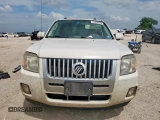 2010 Mercury Mariner Premier с VIN 4M2CN8HG7AKJ29917, выставлен на аукционе Copart как лот 63306425 с пробегом 288 075 миль миль и Списание • Salvage title. История ставок и продаж доступна на DreamBid. Изображение 5.