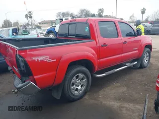 2008 Toyota Tacoma PreRunner with VIN 3TMJU62N98M059769, listed as a IAAI auction lot 41368969 with 213,604 mi miles. Bid and sale history available at carsss.com. Image 4.