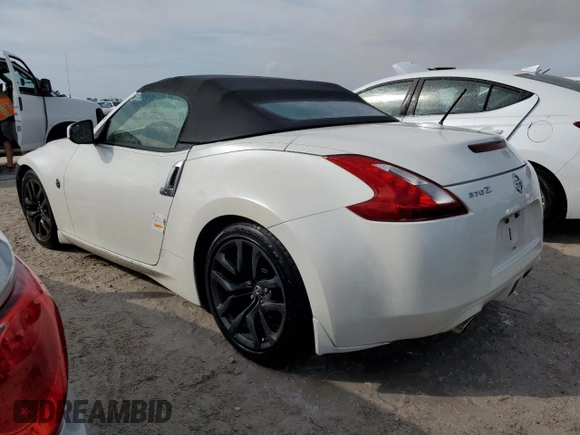 2014 Nissan 370Z Touring with VIN JN1AZ4FH8EM621259, listed as a Copart auction lot 77571454 with Not Provided miles and Salvage Title. Bid and sale history available at DreamBid. Image 2.