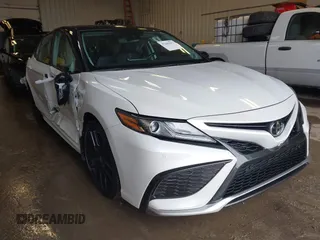 2022 Toyota Camry TRD with VIN 4T1KZ1AK2NU067053, listed as a IAAI auction lot 41441297 with 40,648 mi miles and . Bid and sale history available at DreamBid. Image 1.