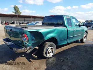 2000 Ford F-150 XL with VIN 1FTRX17L0YKA94650, listed as a IAAI auction lot 41720452 with 112,013 mi miles. Bid and sale history available at carsss.com. Image 6.