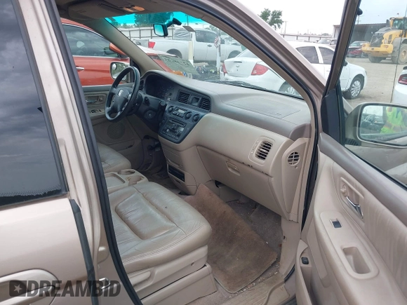 2003 Honda Odyssey EX-L z VIN 5FNRL18063B135949, wystawiony jako IAAI lot #42248105 z przebiegiem 210 567 mil mil oraz . Historia ofert i sprzedaży dostępna na DreamBid. Obrazek 5.