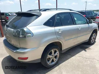 2006 Lexus RX 400h with VIN JTJGW31U362000391, listed as a IAAI auction lot 42687783 with 213,890 mi miles and . Bid and sale history available at DreamBid. Image 4.