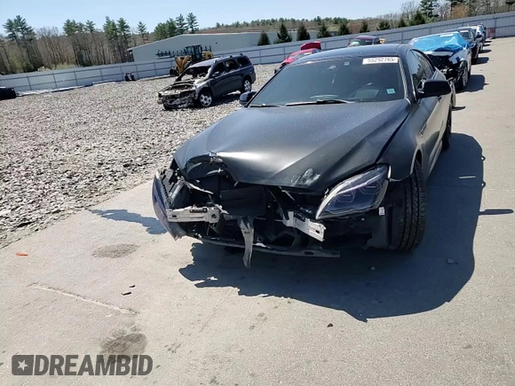 2015 BMW 6 Series 640i xDrive z VIN WBA6B8C53FD453909, wystawiony jako Copart lot #55292765 z przebiegiem 84 971 mil mil oraz Szkoda całkowita • Salvage title. Historia ofert i sprzedaży dostępna na DreamBid. Obrazek 14.