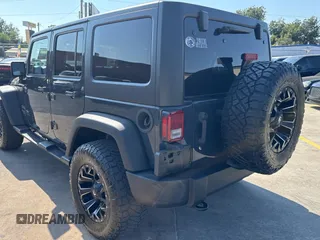 2018 Jeep Wrangler JK Unlimited Sport S with VIN 1C4BJWDG8JL890974, listed as a Copart auction lot 76051434 with 26,581 mi miles and Salvage Title. Bid and sale history available at carsss.com. Image 3.