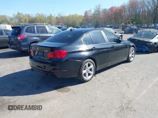 2013 BMW 3 Series 328i xDrive with VIN WBA3B5G53DNS04643, listed as a IAAI auction lot 42143365 with 107,448 mi miles. Bid and sale history available at carsss.com. Image 4.