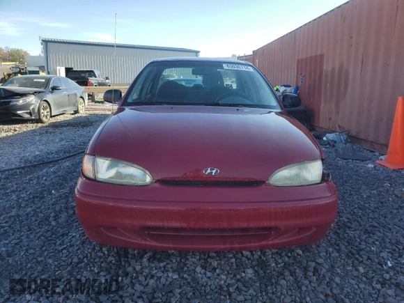 1997 Hyundai Accent с VIN KMHVF24N5VU369924, выставлен на аукционе Copart как лот 85036114 с пробегом 168 797 миль миль и Списание • Salvage title. История ставок и продаж доступна на DreamBid. Изображение 5.