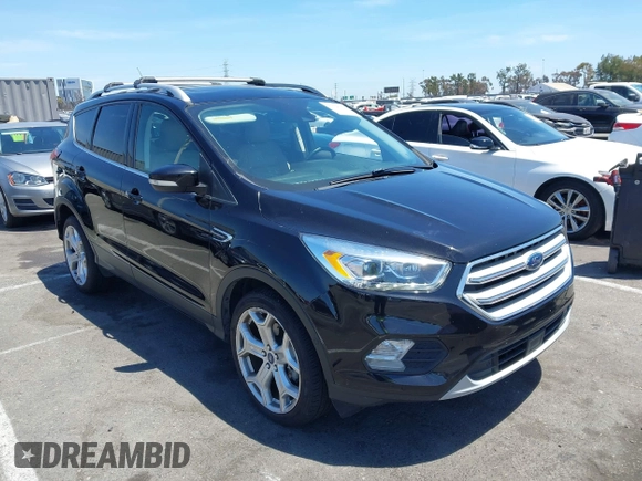 2019 Ford Escape Titanium with VIN 1FMCU9J98KUA21480, listed as a IAAI auction lot 42698275 with 65,478 mi miles and . Bid and sale history available at DreamBid. Image 1.