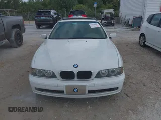 2002 BMW 5 Series 525iAT with VIN WBADS43482GD86937, listed as a IAAI auction lot 41940547 with 196,458 mi miles. Bid and sale history available at carsss.com. Image 6.