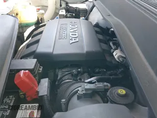 2011 Honda Pilot Touring with VIN 5FNYF3H98BB034357, listed as a IAAI auction lot 42939634 with 116,346 mi miles and . Bid and sale history available at DreamBid. Image 20.