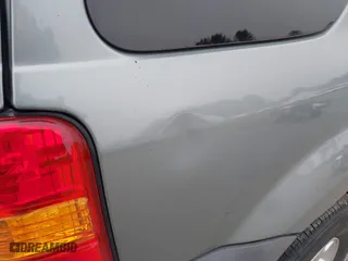 2007 Ford Escape XLT with VIN 1FMYU931X7KA51242, listed as a IAAI auction lot 41606245 with 1 mi miles. Bid and sale history available at carsss.com. Image 6.