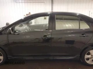 2008 Toyota Yaris with VIN JTDBT903581284634, listed as a IAAI auction lot 40553888 with 180,563 mi miles. Bid and sale history available at carsss.com. Image 14.