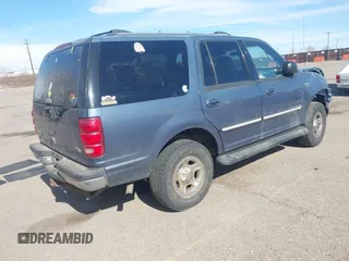 1999 Ford Expedition XLT z VIN 1FMPU18L2XLB43236, wystawiony jako IAAI lot #41792317 z przebiegiem 157 636 mil mil oraz . Historia ofert i sprzedaży dostępna na DreamBid. Obrazek 4.