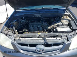 2003 Mazda Tribute ES with VIN 4F2CZ96113KM52877, listed as a IAAI auction lot 42217251 with 218,475 mi miles and . Bid and sale history available at DreamBid. Image 10.
