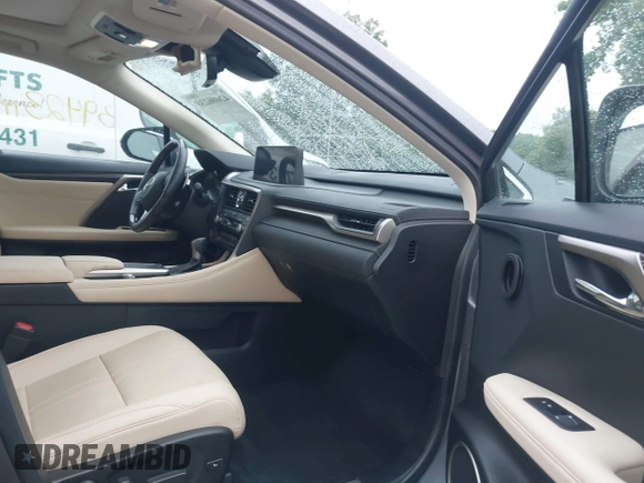 2022 Lexus RX 450h z VIN 2T2JGMDA7NC075586, wystawiony jako IAAI lot #42606238 z przebiegiem 39 423 mil mil oraz . Historia ofert i sprzedaży dostępna na DreamBid. Obrazek 5.