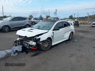 2011 Mitsubishi Lancer Evolution GSR with VIN JA32W8FV9BU045781, listed as a IAAI auction lot 41308314 with 102,840 mi miles. Bid and sale history available at carsss.com. Image 18.