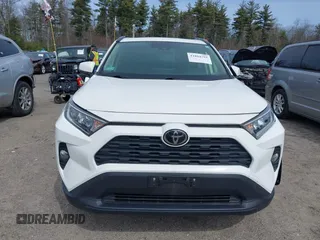 2019 Toyota RAV4 XLE with VIN JTMP1RFV7KD521148, listed as a IAAI auction lot 41884793 with 19,590 mi miles. Bid and sale history available at carsss.com. Image 12.