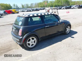 2003 MINI Hardtop with VIN WMWRC33463TC41773, listed as a IAAI auction lot 42223276 with 115,127 mi miles and . Bid and sale history available at DreamBid. Image 4.