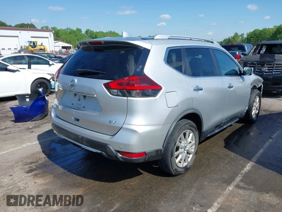 2019 Nissan Rogue SV with VIN KNMAT2MT2KP530752, listed as a IAAI auction lot 41989426 with 126,439 mi miles and . Bid and sale history available at DreamBid. Image 4.