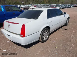2007 Cadillac DTS Luxury I with VIN 1G6KD57Y17U126850, listed as a IAAI auction lot 41907481 with 123,977 mi miles. Bid and sale history available at carsss.com. Image 4.