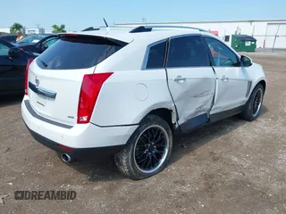 2013 Cadillac SRX Performance Collection with VIN 3GYFNHE3XDS520177, listed as a IAAI auction lot 42536457 with 217,963 mi miles and . Bid and sale history available at DreamBid. Image 4.