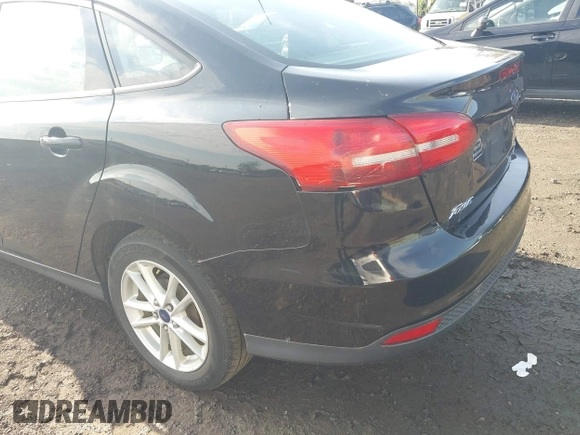 2016 Ford Focus SE with VIN 1FADP3F26GL204663, listed as a IAAI auction lot 42664653 with 138,141 mi miles and . Bid and sale history available at DreamBid. Image 6.