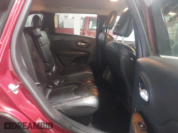 2015 Jeep Cherokee Limited with VIN 1C4PJLDS0FW585595, listed as a IAAI auction lot 41371621 with 102,108 mi miles and . Bid and sale history available at DreamBid. Image 8.