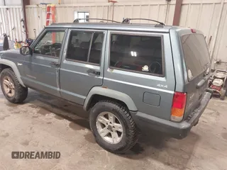 1998 Jeep Cherokee Sport with VIN 1J4FJ68S5WL212555, listed as a IAAI auction lot 42450810 with 257,582 mi miles and . Bid and sale history available at DreamBid. Image 3.