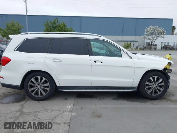 2016 Mercedes-Benz GL with VIN 4JGDF6EE9GA676180, listed as a IAAI auction lot 41976350 with 95,348 mi miles. Bid and sale history available at carsss.com. Image 14.