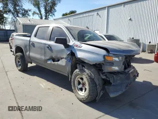 2021 Chevrolet Silverado 1500 Custom Trail Boss with VIN 1GCPYCEF5MZ430436, listed as a Copart auction lot 77466634 with 60,656 mi miles and Salvage Title. Bid and sale history available at DreamBid. Image 4.